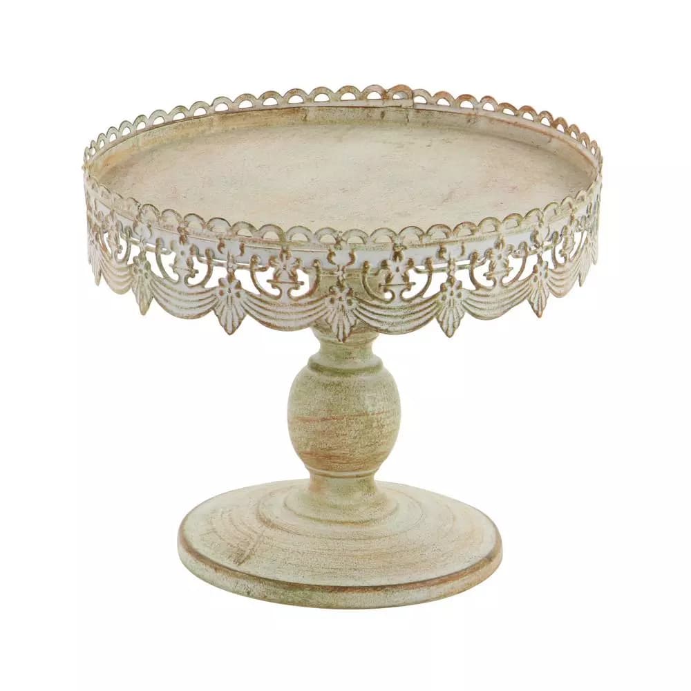 LITTON LANE 10 in. Round Whitewashed and Rust Brown Iron Cake Stand with Pierced Floral Bunting