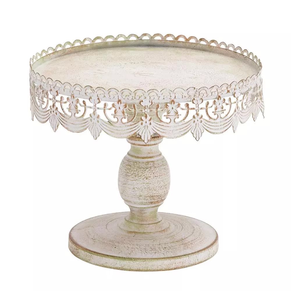 LITTON LANE 10 in. Round Whitewashed and Rust Brown Iron Cake Stand with Pierced Floral Bunting