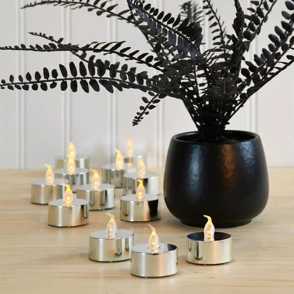 LUMABASE Silver Plated LED Tea Light Candles, 12-Count Battery Operated Flickering Amber Glow