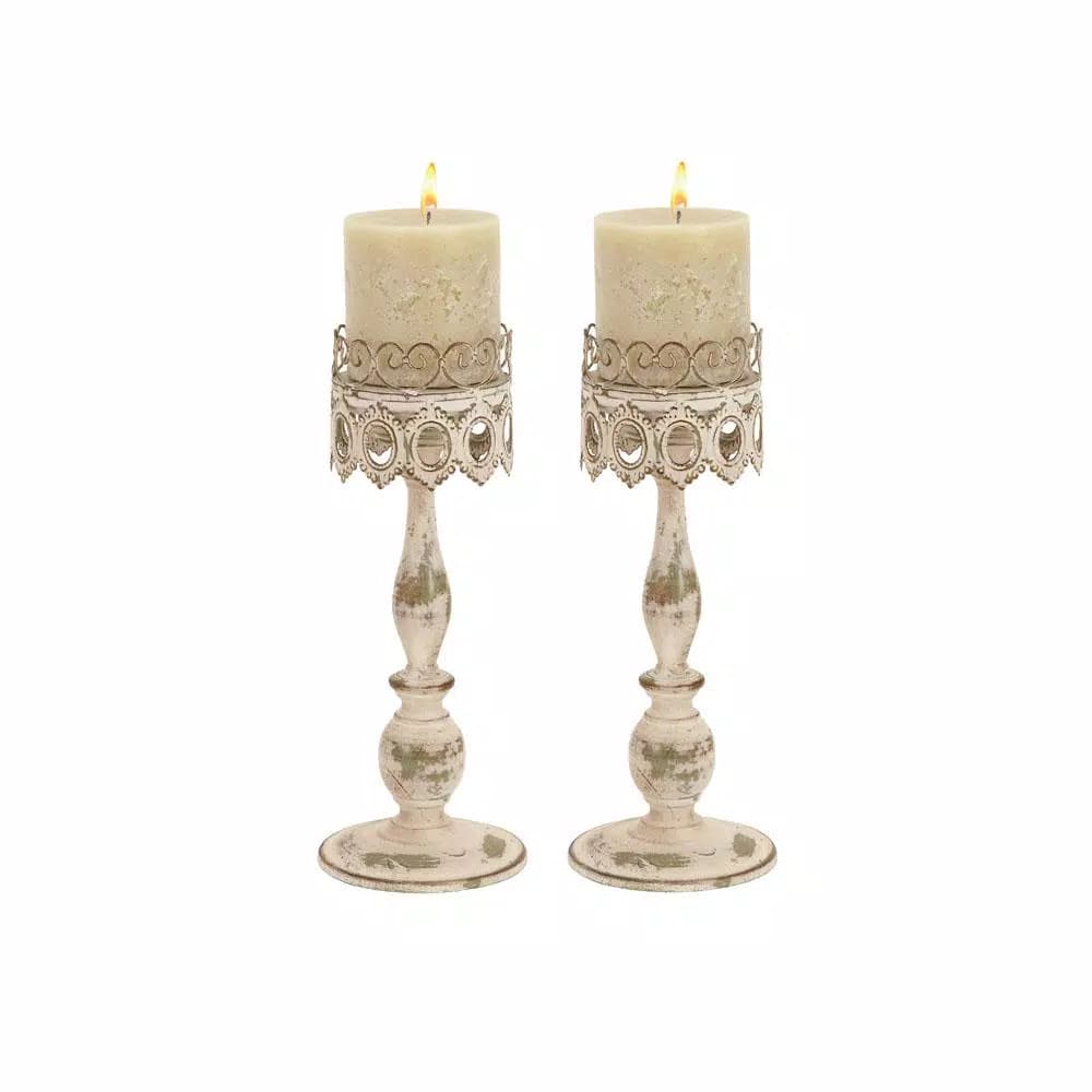 LITTON LANE 14 in. Distressed Ivory Iron Pillar Candle Holders with Filigree Design (Set of 2)