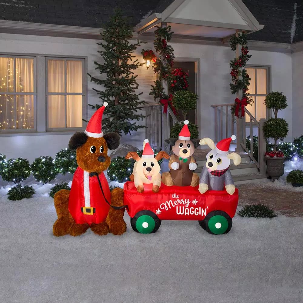 Home Accents Holiday 7 ft. W Pre-Lit Inflatable Christmas Puppy Wagon Scene with LED Lights