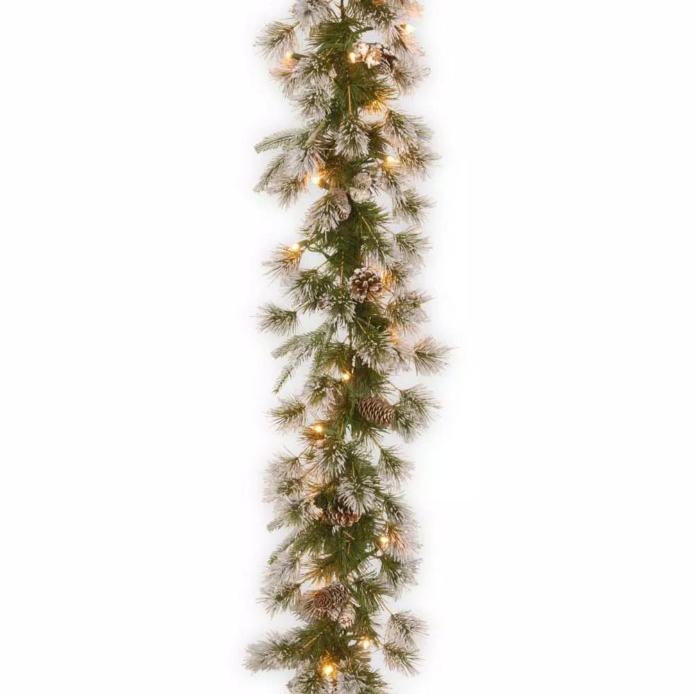 Unbranded 9 ft. Liberty Pine Garland with 50 Clear Lights, Pine Cones and Snow Flocking