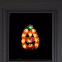 Northlight 12 in. Orange Holographic Lighted Pumpkin Halloween Window Silhouette Decoration thumbnail 2