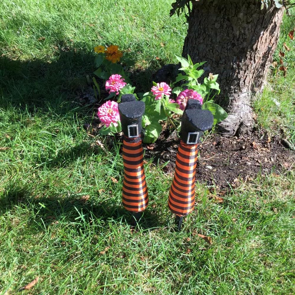 Unbranded 18 in. Witch Leg Stakes - Black and Orange Striped Halloween Yard Decoration