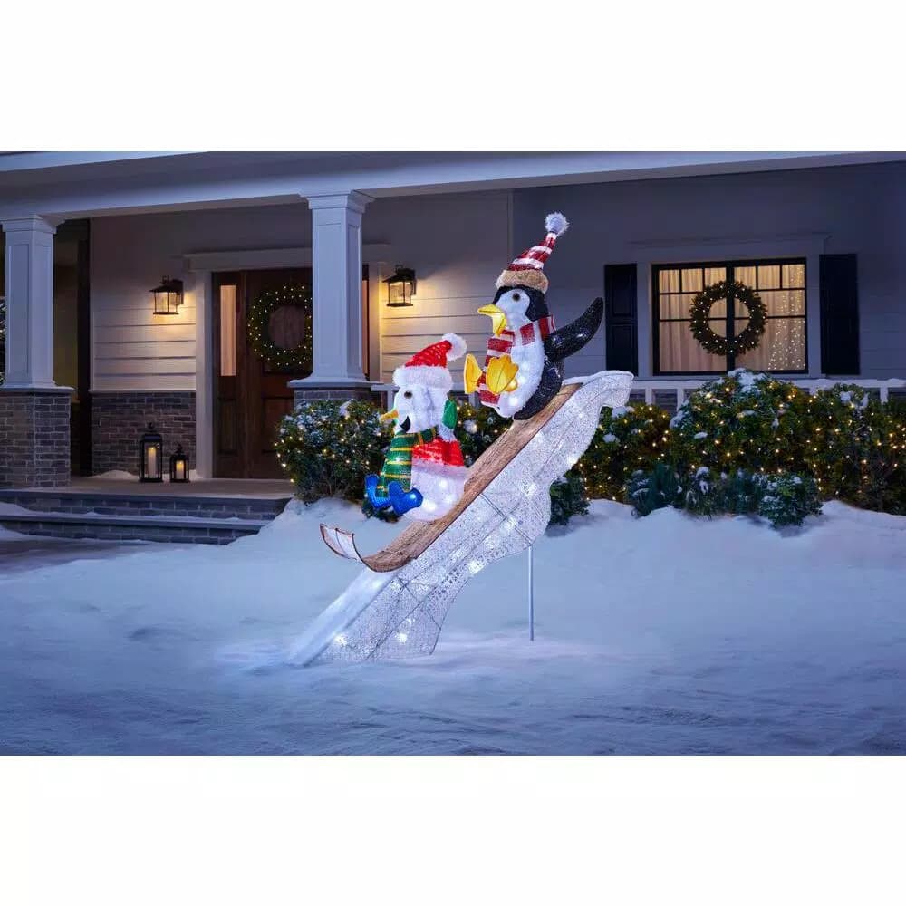 Home Accents Holiday 4 ft LED Penguin and Skating Snowman Yard Decoration