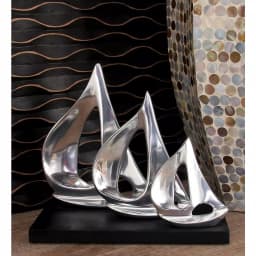 LITTON LANE 9 in. Stylized Sailboat Decorative Sculpture - Polished Silver Aluminum on Black Wood Base thumbnail 1