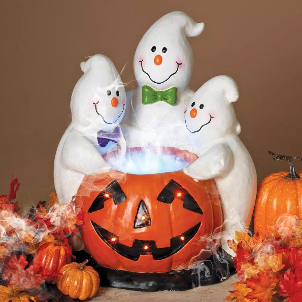 Gerson 22.24 in. Magnesium Electric Smoking Jack-O-Lantern with Ghostly Trio Halloween Tabletop Decor