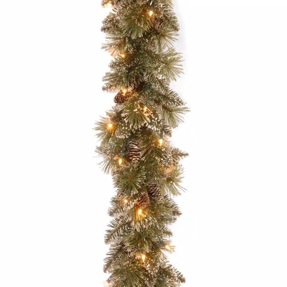 Unbranded 9 ft. Glittery Bristle Pine Garland with 50 Clear Lights and Pine Cones