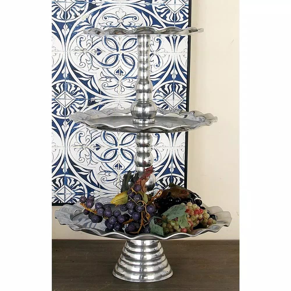 LITTON LANE 24 in. Polished Silver Aluminum 3-Tier Wavy-Ribbon-Rimmed Round Tray Stand