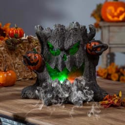 Gerson 12.4 in. Electric Smoking Haunted Tree Stump Halloween Tabletop Decor with Color Changing LED Lights thumbnail 1