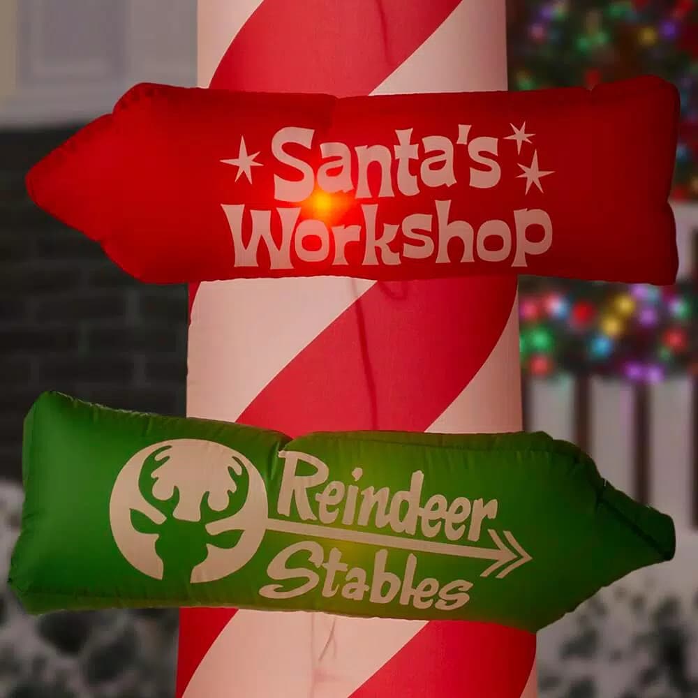 Airblown 8 ft. Inflatable Candy Cane with Directional Stacking Signs Holiday Decoration