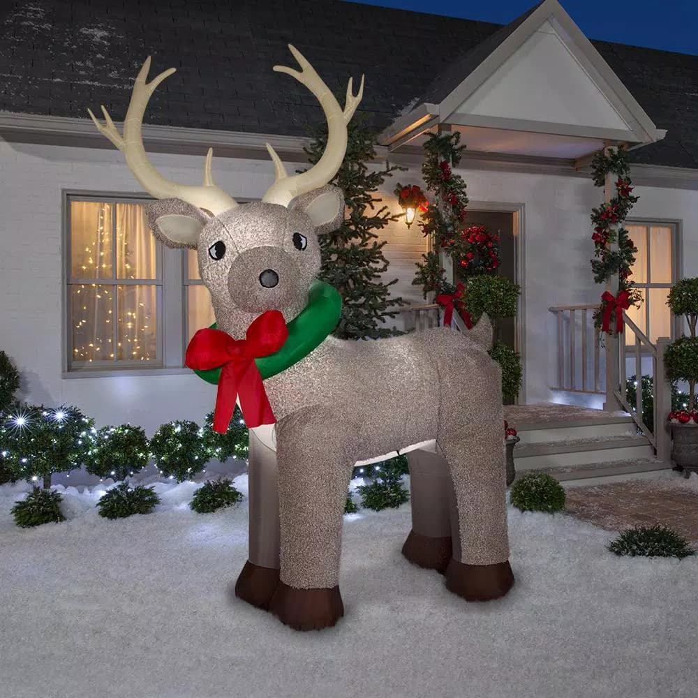 Home Accents Holiday 11 ft. Pre-Lit Giant Airblown Inflatable Fuzzy Reindeer with LED Lights