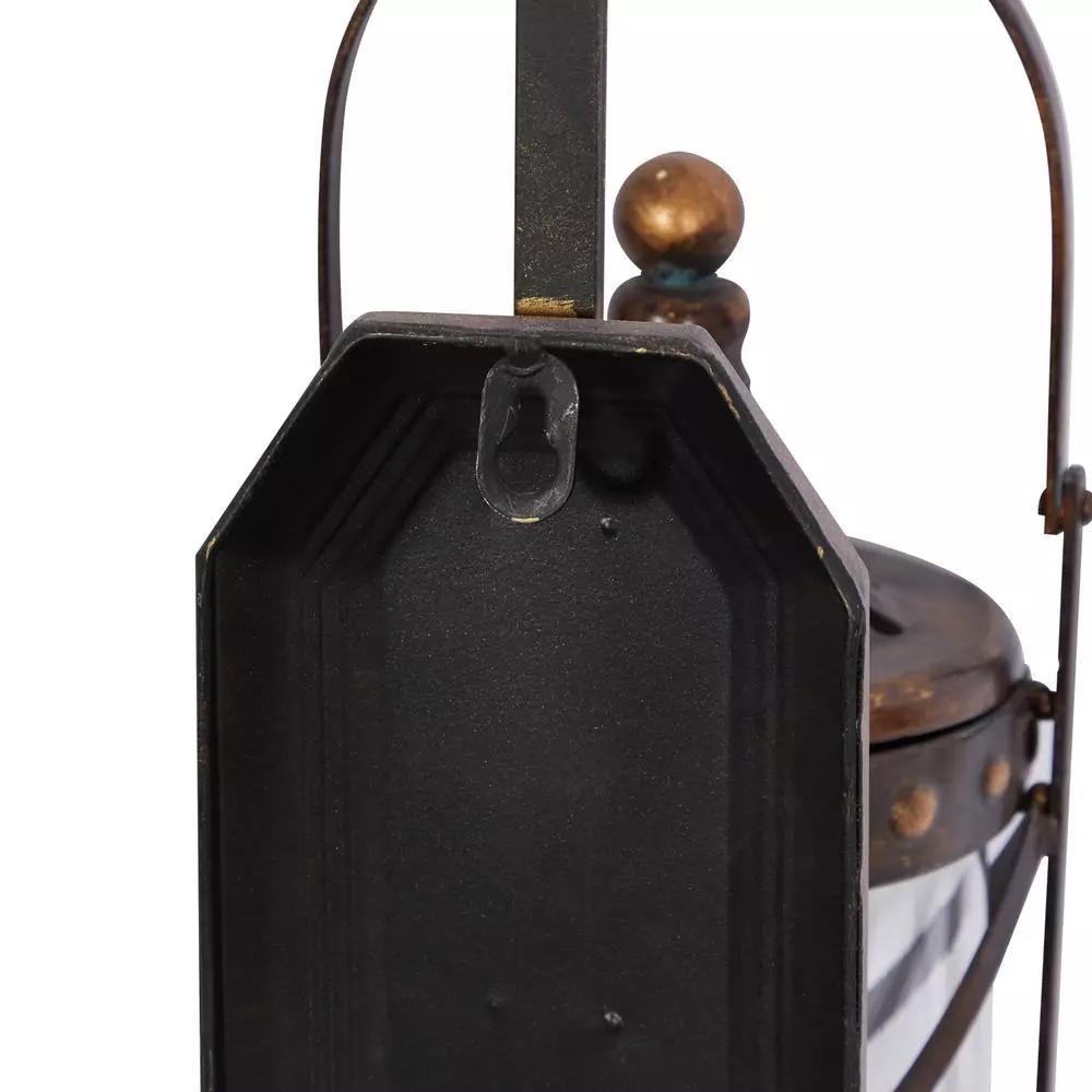 LITTON LANE Old World Riveted Burnished Bronze Iron Candle Sconce with Fleur-de-lis Motif