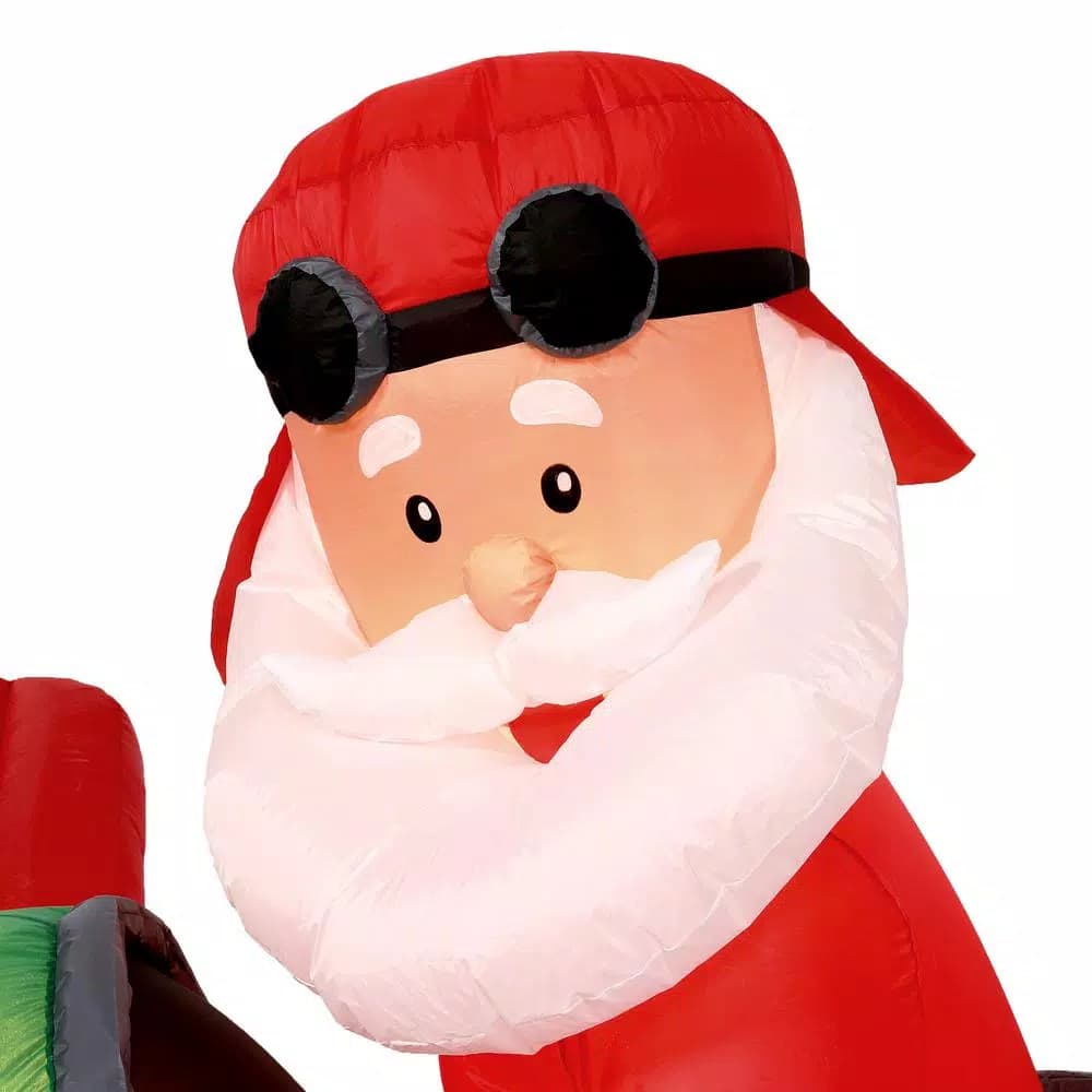 Home Accents Holiday 16 ft. Airblown Inflatable Santa on Airplane with Penguin and Merry Christmas Banner