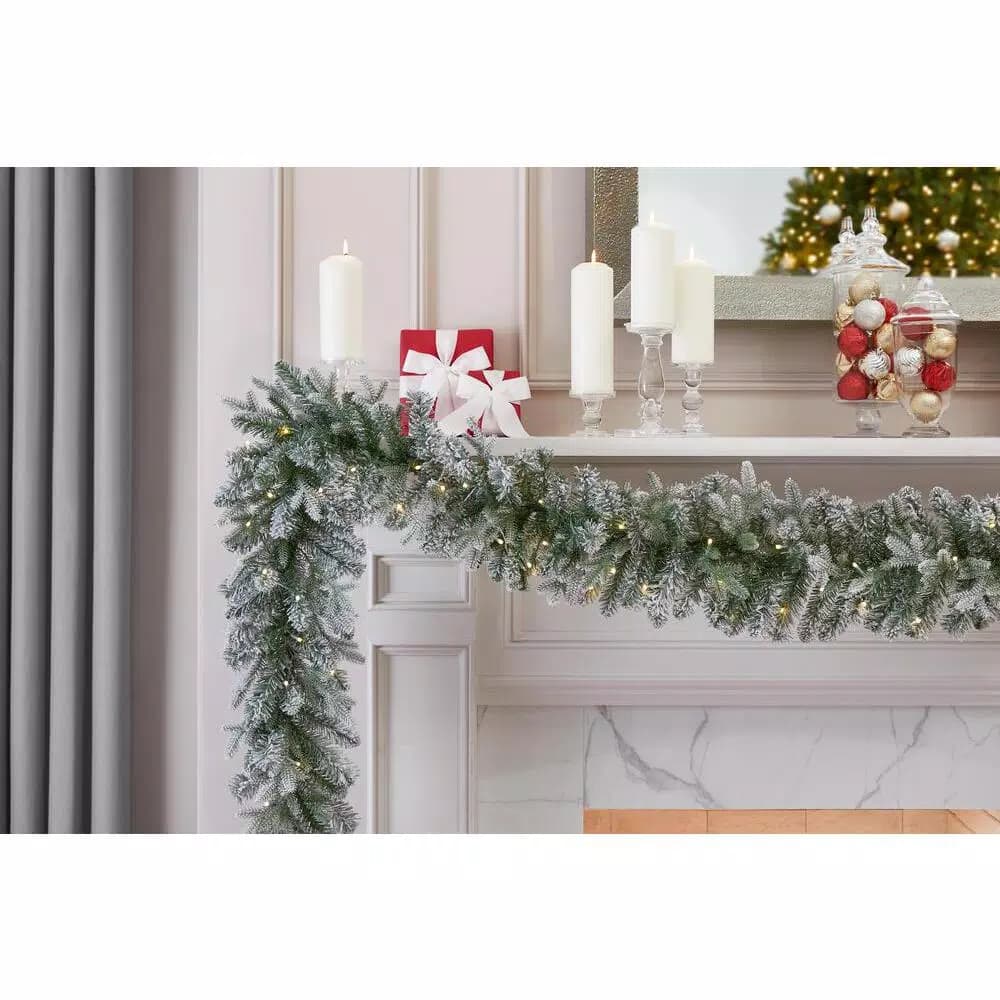 Home Accents Holiday 9 ft. Pre-Lit Flocked Frasier Fir LED Garland with Timer