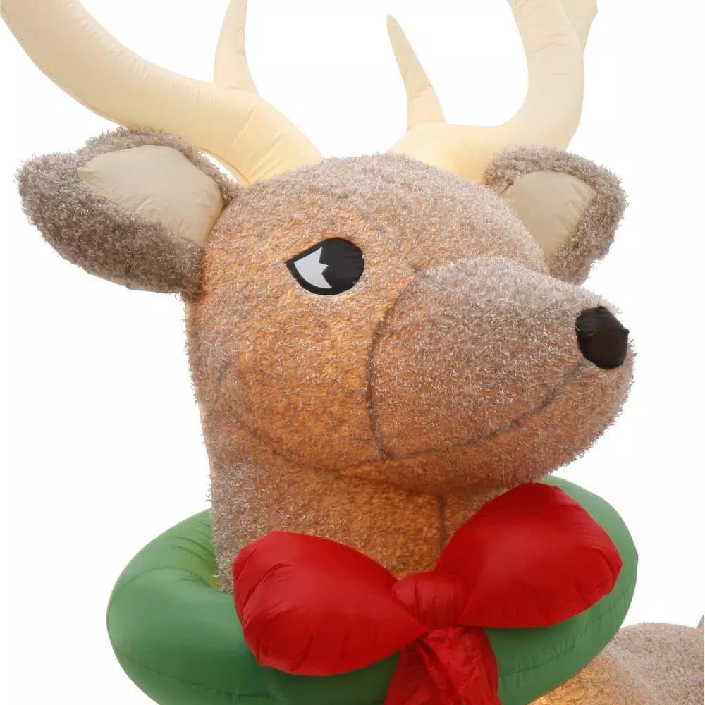 Home Accents Holiday 11 ft. Pre-Lit Giant Airblown Inflatable Fuzzy Reindeer with LED Lights