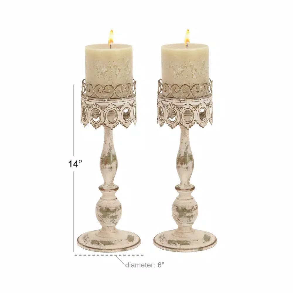 LITTON LANE 14 in. Distressed Ivory Iron Pillar Candle Holders with Filigree Design (Set of 2)