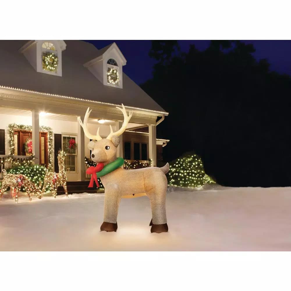 Home Accents Holiday 11 ft. Pre-Lit Giant Airblown Inflatable Fuzzy Reindeer with LED Lights
