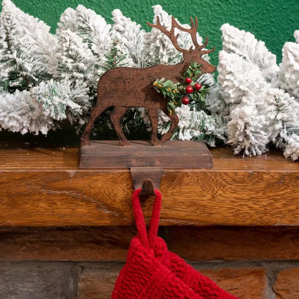 Glitzhome 6.50 in. Reindeer Stocking Holder with Green Garlands and Red Berries, Wooden and Metal