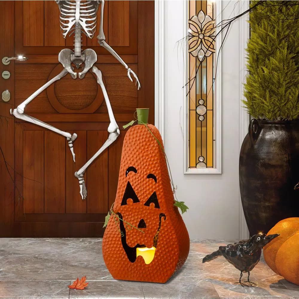 Glitzhome 23.62 in. Metal Jack-O-Lantern Halloween Decor with LED Pillar Candle