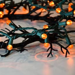 LUMABASE 70-Light LED Orange Globe String Lights, Weather Resistant, 14.58 ft, Green Cord thumbnail 4