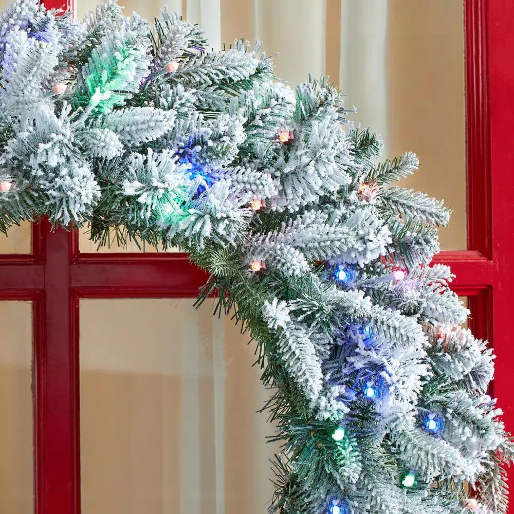 Home Accents Holiday Home Holiday Accents 30 in. Flocked Pine LED Prelit Wreath with 50 Warm White Lights and Timer