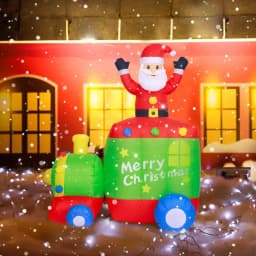 JOYDECOR 6 ft. Santa Claus on Train Christmas Inflatable with Built-in LED Lights thumbnail 8