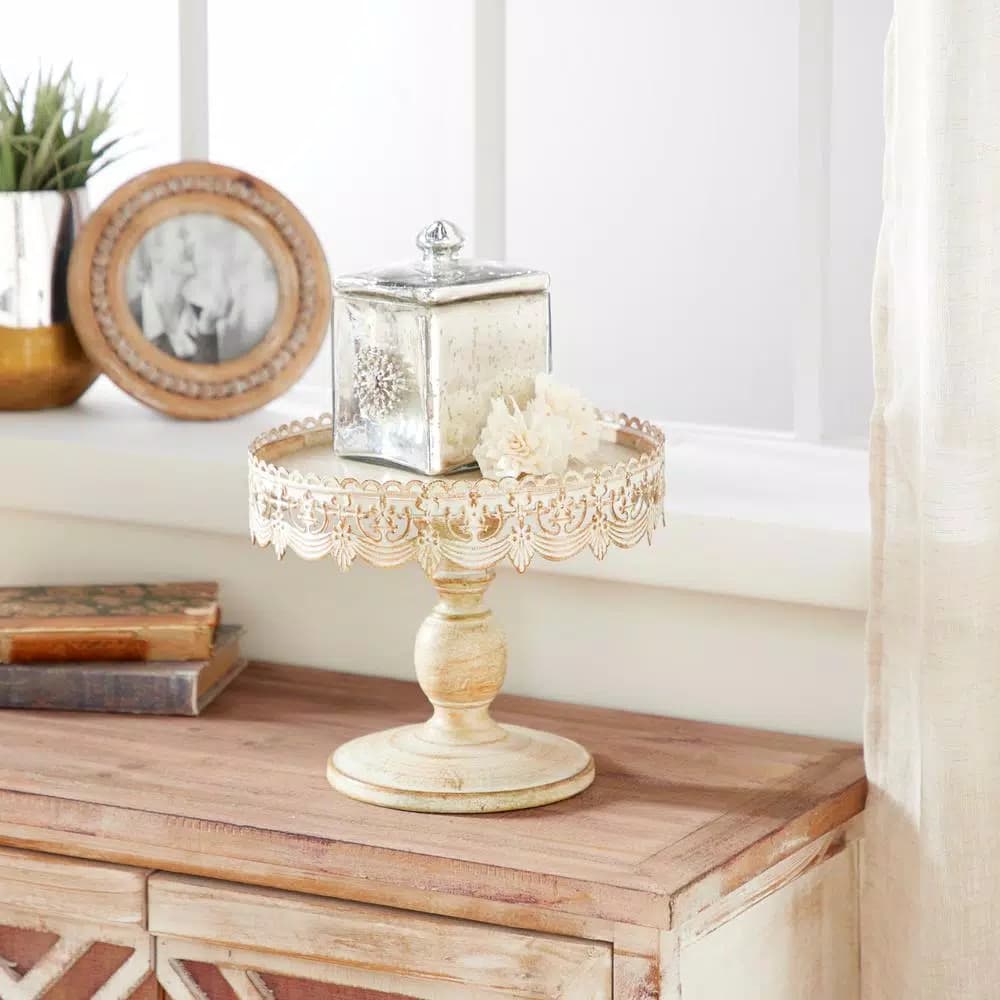 LITTON LANE 10 in. Round Whitewashed and Rust Brown Iron Cake Stand with Pierced Floral Bunting
