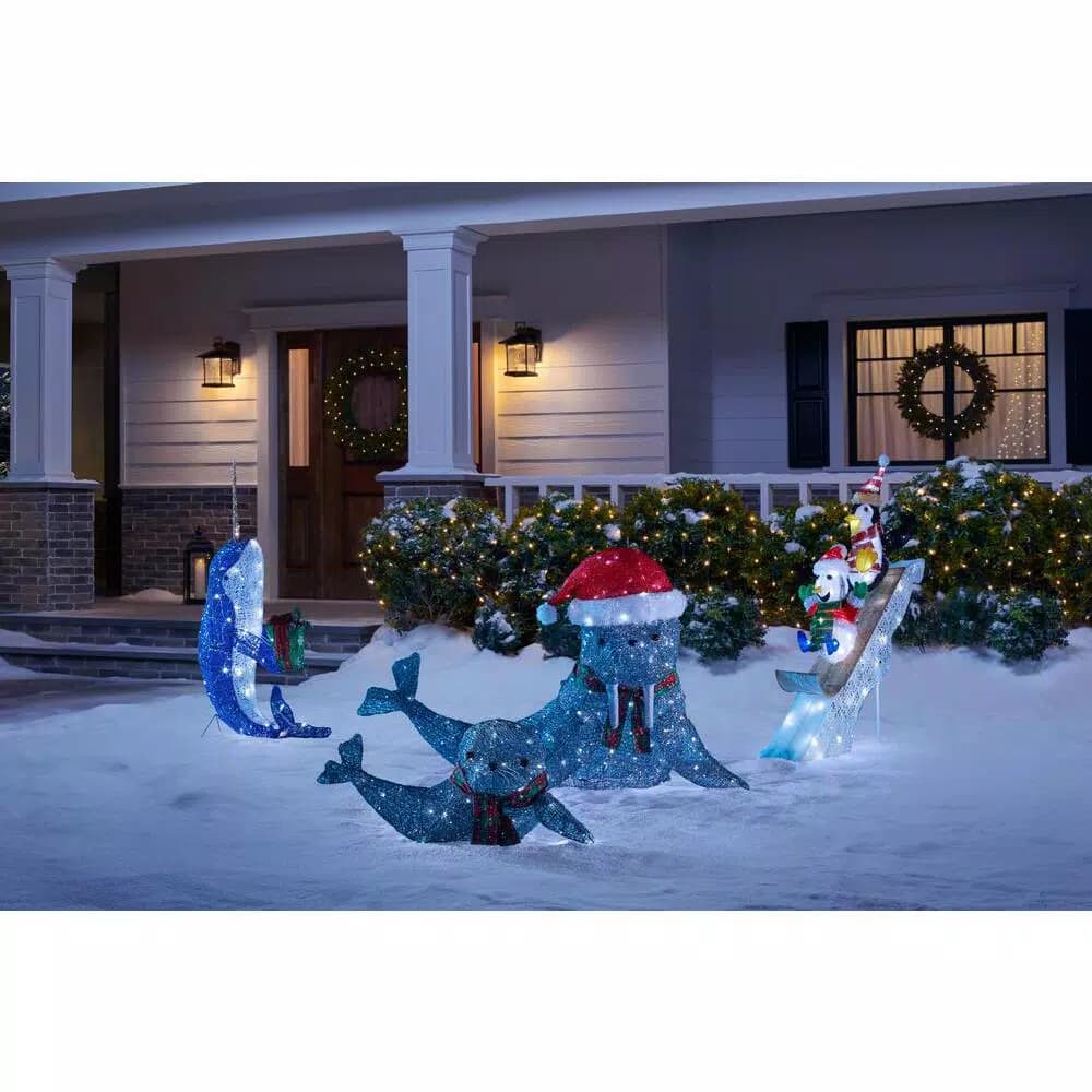 Home Accents Holiday 4 ft LED Penguin and Skating Snowman Yard Decoration