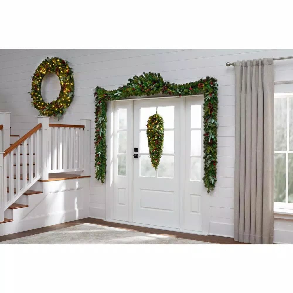 Home Accents Holiday Woodmoore 17 ft. Artificial Christmas Garland with Poinsettias, Berries, and Pinecones