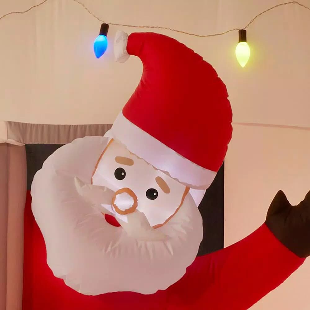 Unbranded 7 ft. Pre-Lit Inflatable Jolly Holiday Camper with Santa, Snowman, and Reindeer