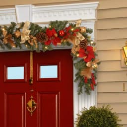 National Tree Company 6 ft. Pre-lit Artificial Fir Garland with LED Lights, Poinsettias, Berries, and Ornaments thumbnail 2