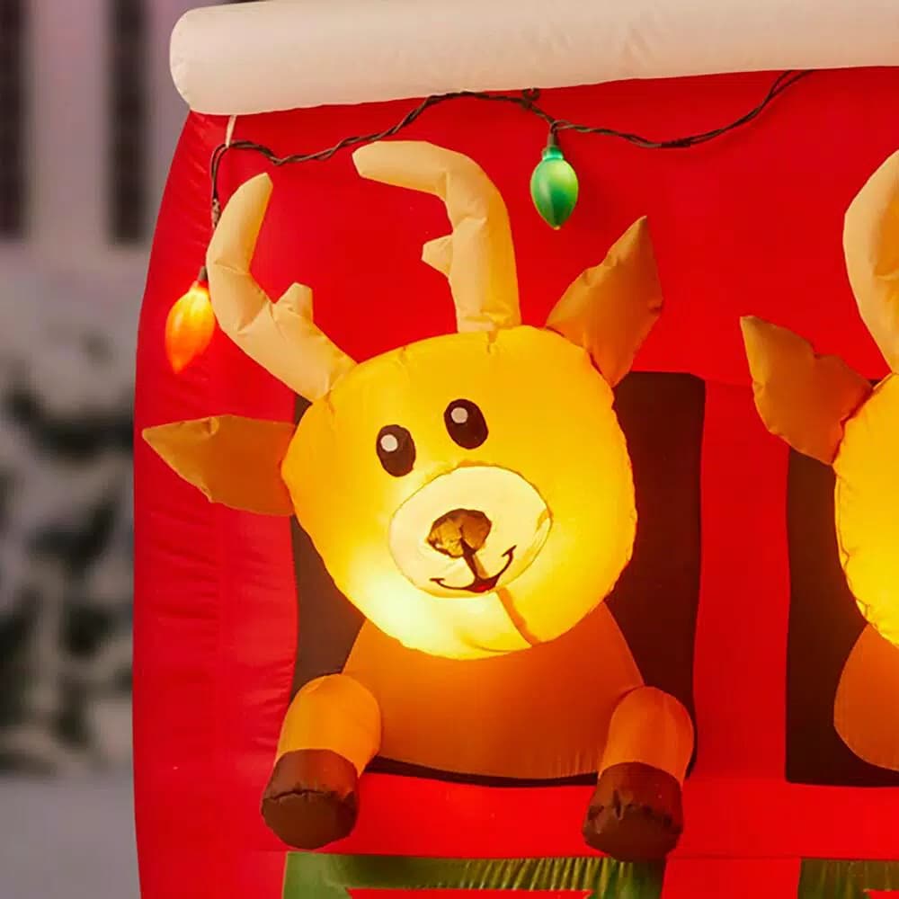 Home Accents Holiday 9 ft LED Inflatable Santa's Stable with Reindeer Holiday Decor