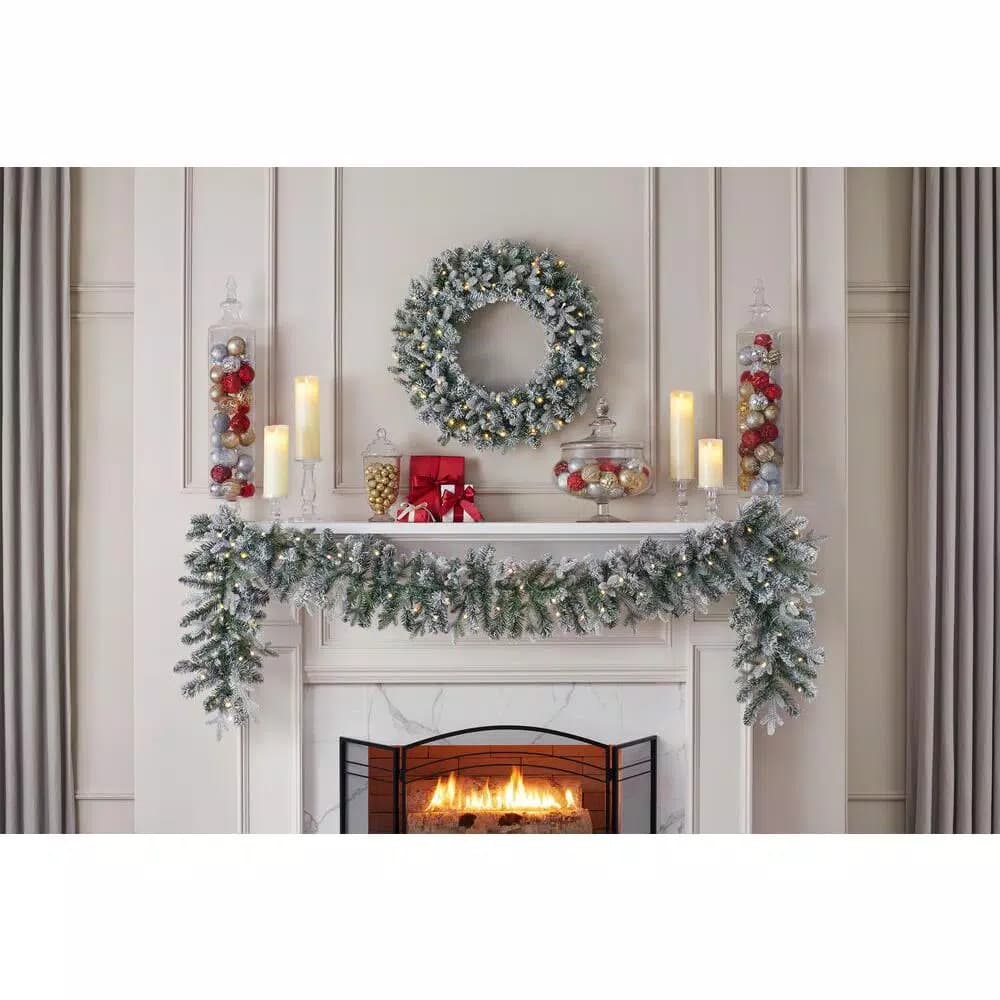 Home Accents Holiday 9 ft. Pre-Lit Flocked Frasier Fir LED Garland with Timer