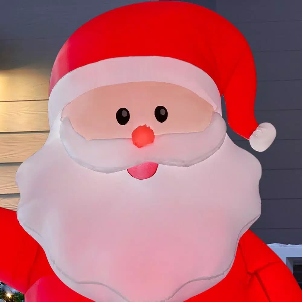 Home Accents Holiday 6.5 ft. Airblown Inflatable Santa with Present, LED Holiday Decoration