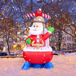 JOYDECOR 6 ft. Santa Claus on Helicopter Christmas Inflatable with Built-in LED Lights thumbnail 9