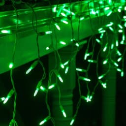 Wintergreen Lighting 7 ft. Green M5 LED Icicle Lights, 70-Light Set with White Wire thumbnail 2
