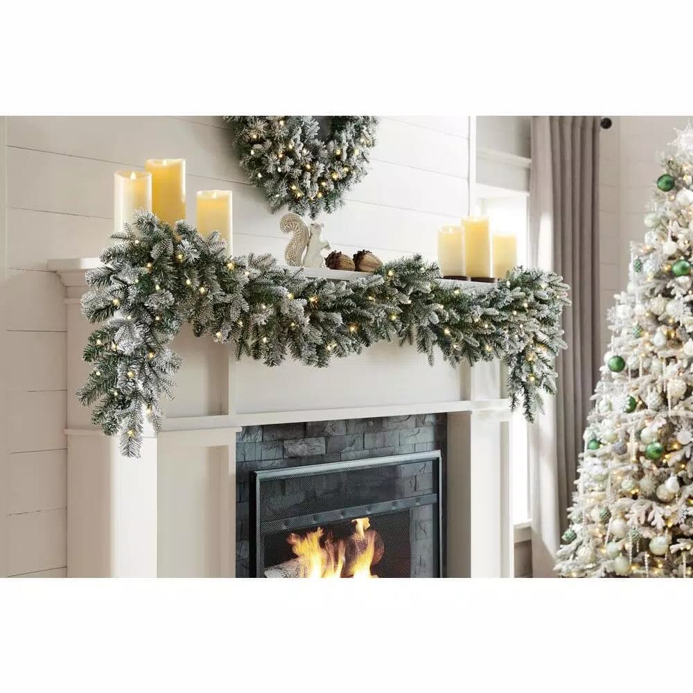 Home Accents Holiday 9 ft. Pre-Lit Flocked Frasier Fir LED Garland with Timer