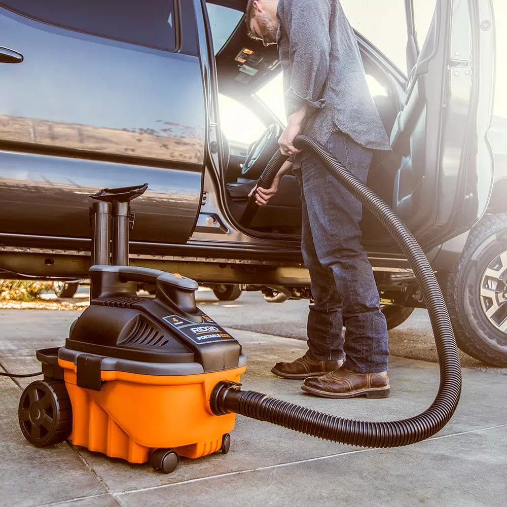 RIDGID 4 Gal. 5.0 Peak HP Portable Wet/Dry Shop Vacuum with 7 ft. Hose and Accessories