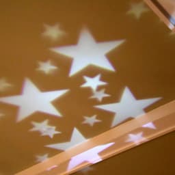 LUMABASE White Stars LED Projector Light - Rotating Indoor/Outdoor Holiday Decor thumbnail 5