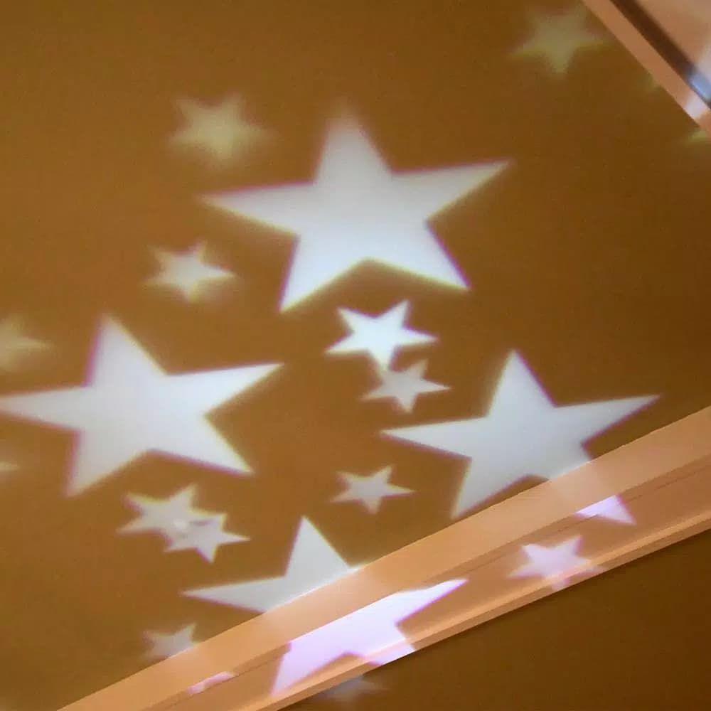 LUMABASE White Stars LED Projector Light - Rotating Indoor/Outdoor Holiday Decor