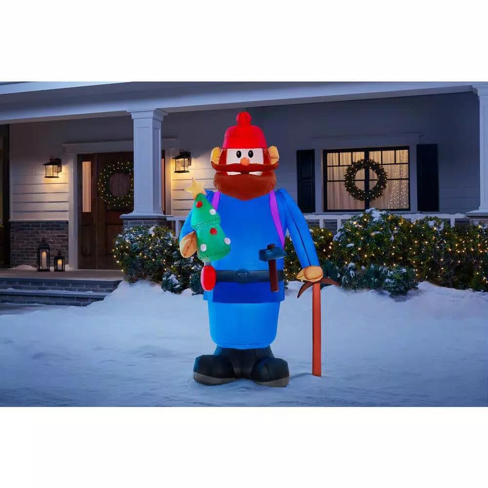 Rudolph 6 ft. Airblown Inflatable Yukon Cornelius with Tiny Christmas Tree - Rudolph the Red-Nosed Reindeer Decor