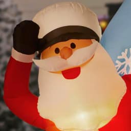 Home Accents Holiday 7 ft. Pre-Lit LED Inflatable Santa in Sailboat with Penguin Christmas Decoration thumbnail 4