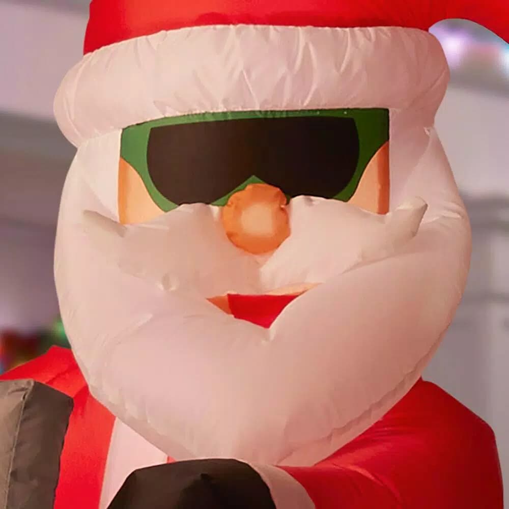 Unbranded 6 ft. Pre-Lit Inflatable Santa Driving Snowmobile Holiday Decoration