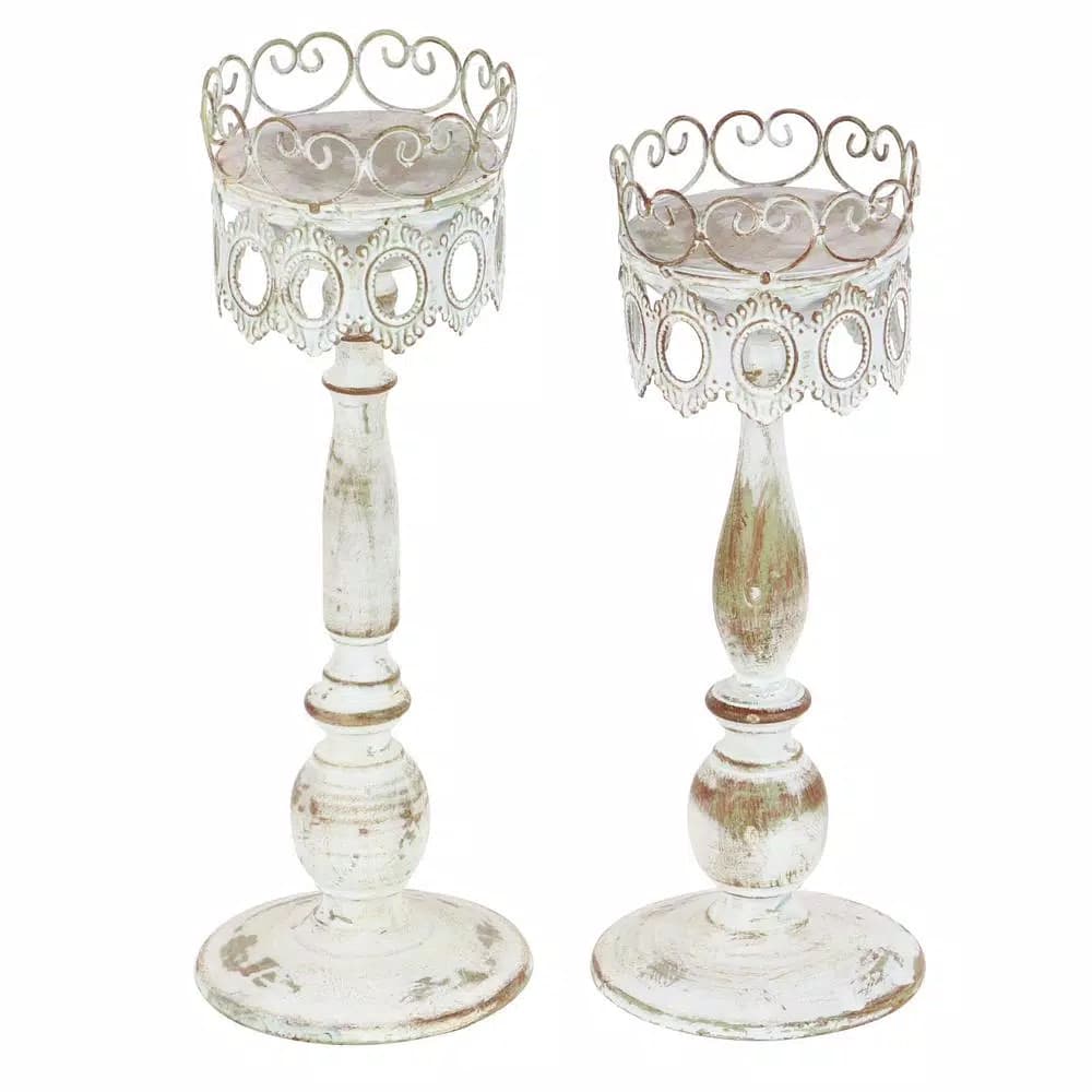 LITTON LANE 14 in. Distressed Ivory Iron Pillar Candle Holders with Filigree Design (Set of 2)