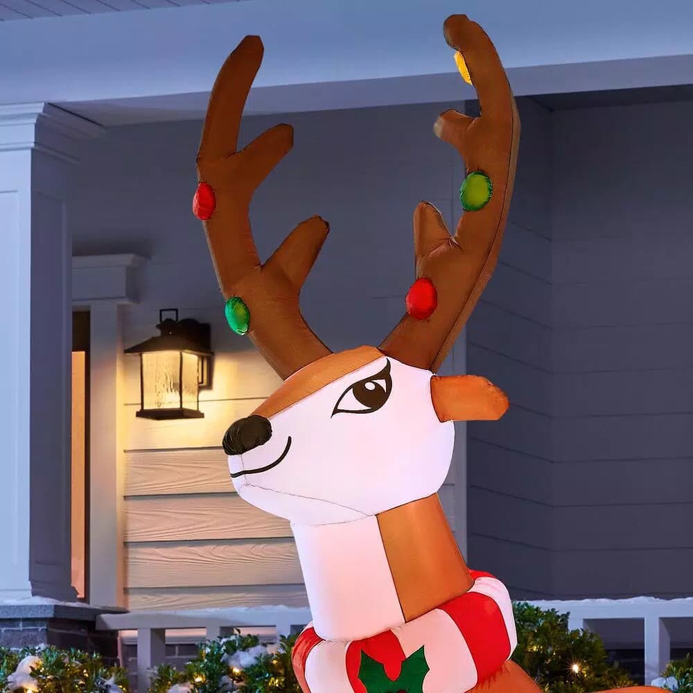 Home Accents Holiday 6 ft. Airblown Inflatable Reindeer with LED Lights and Striped Scarf