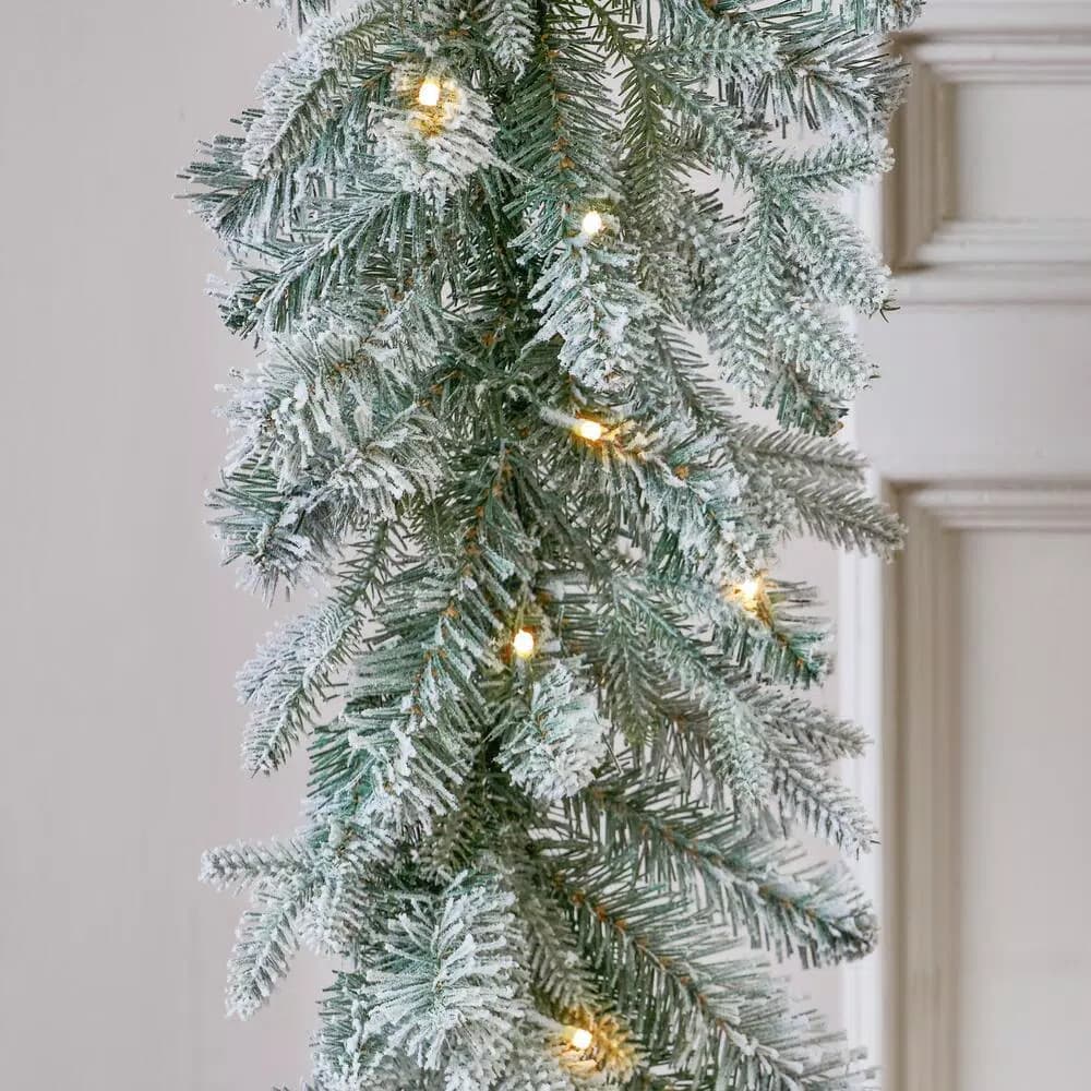 Home Accents Holiday 9 ft. Pre-Lit Flocked Frasier Fir LED Garland with Timer