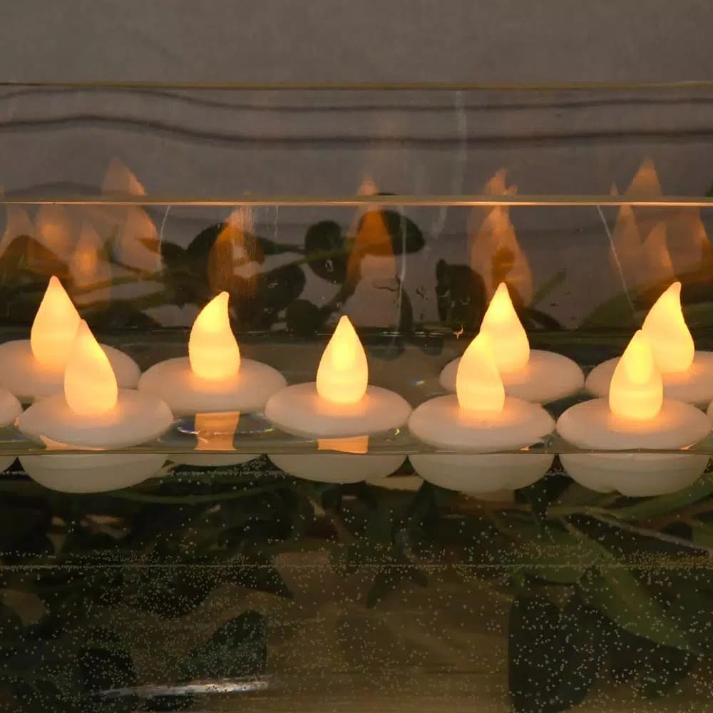 LUMABASE Amber Floating LED Tea Light Candles, Waterproof Battery Operated, 1.25 x 1.25 in, 12-Count