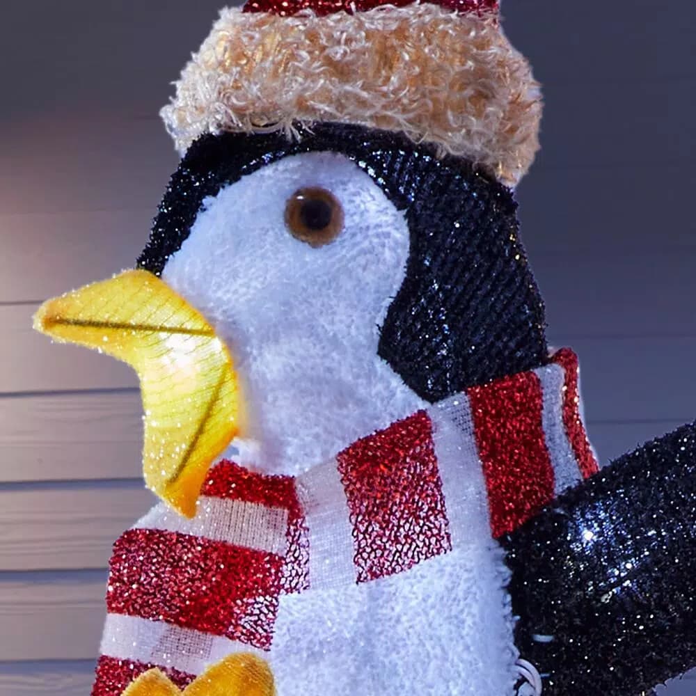 Home Accents Holiday 4 ft LED Penguin and Skating Snowman Yard Decoration