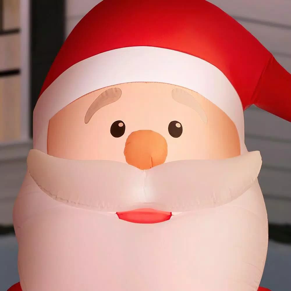 Home Accents Holiday Gemmy Industries 12 ft. Giant Inflatable Santa with LED Lights and Candy Cane